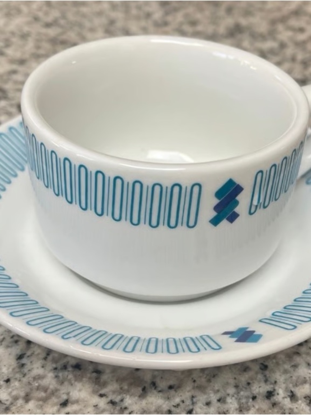 White Ceramic Coffee Cup and Saucer with Blue Teal Pattern - Unbranded